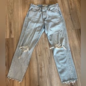 Light blue Levis with rips, size 26